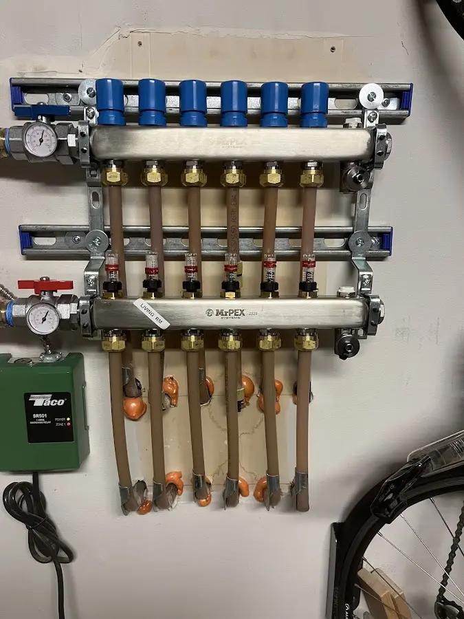 Plumber performing Gas Leak Detection at a residential property in Woodland